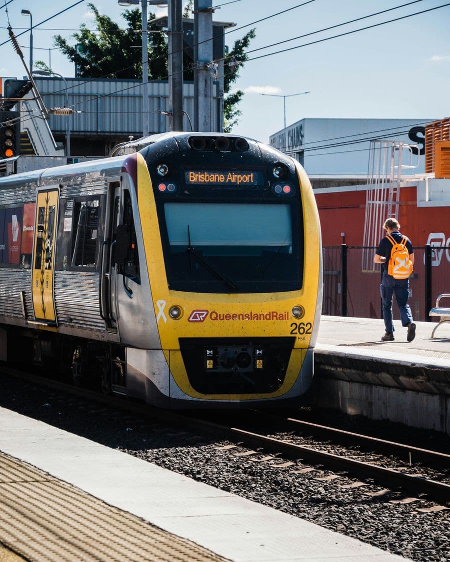 A commuter train at a suburban railway station platform