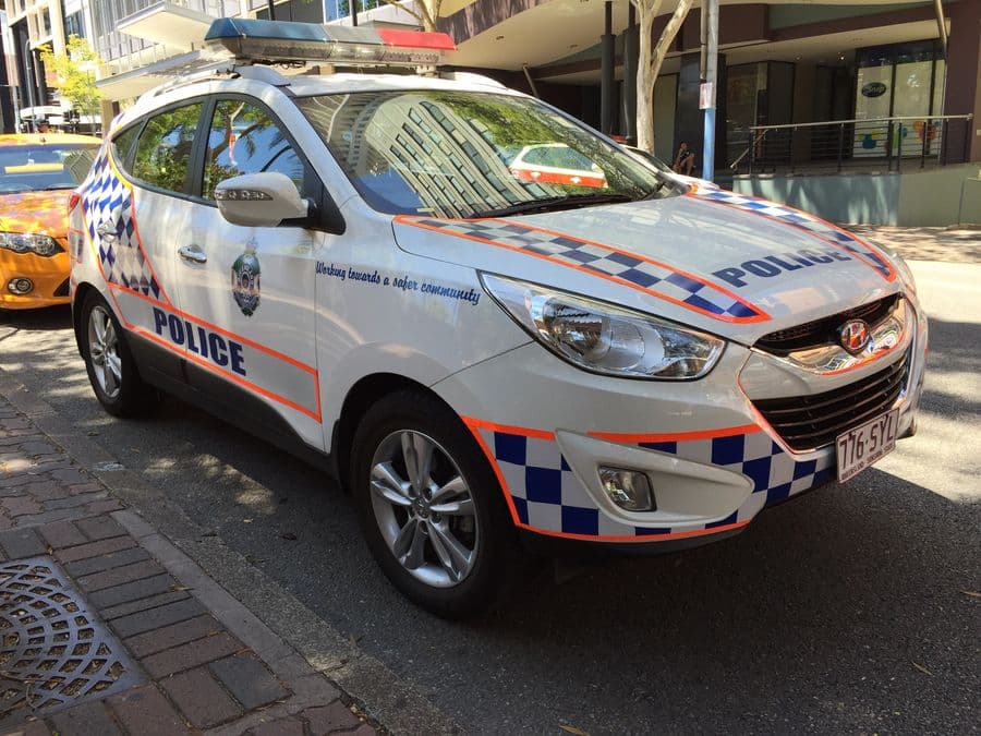 A Queensland Police Service Hyundai ix35 patrol car parked in central Brisbane, illustrative of a QPS response in the Logan region.