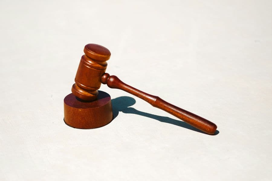Scales of justice statue representing the legal system